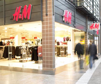 Clothes retailer H&M reports lower first quarter profits 