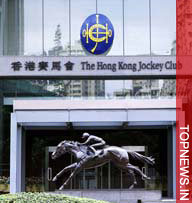 Former top Hong Kong businessman charged with Jockey Club fraud 