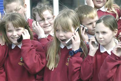 Kids as young as 9 have mobile phones as parents seek safety