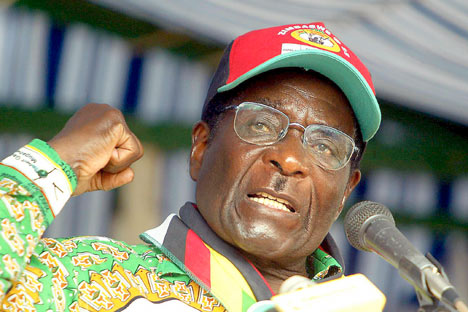 Mugabe's party fully behind power-sharing deal 