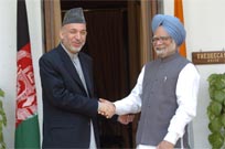 Karzai meets Manmohan Singh, offers condolences for Mumbai attacks