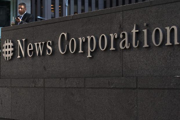 News Corp board approves pan to split firm