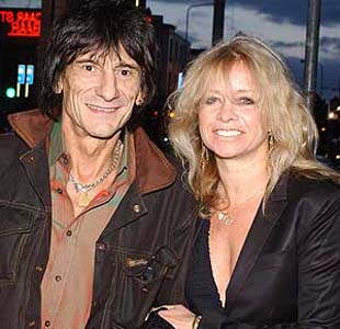 Rolling Stones guitarist's wife forgives him