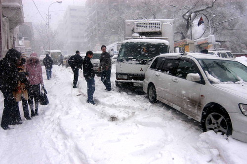Snowstorm-hit areas of China recovering slowly