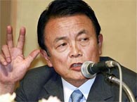Support for Japanese Premier Aso up amid opposition scandal 