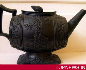 Old, chipped teapot fetches £80k at auction!