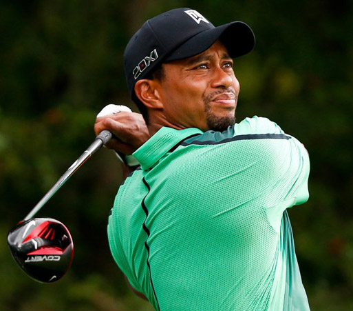 Woods hits sparkling form on day one of Open with three-under 69