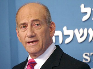 Olmert promises to release more Palestinian prisoners 