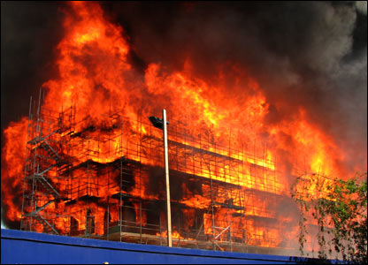 Firemen tackle blaze in office block in central London 
