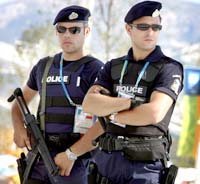 Greek police officer shoots security guard 