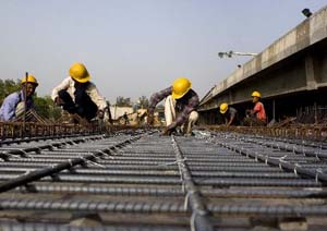 Infra firms cheer as steel, cement prices drop