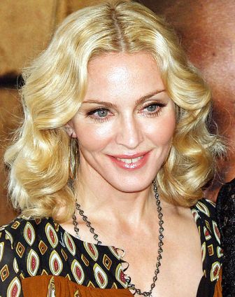 Madonna sacks personal trainer