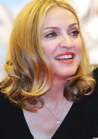 Madonna donates favourite Christian Dior heels for charity