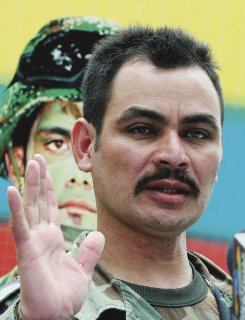 Rebel who killed FARC boss and cut off hand on strike for reward