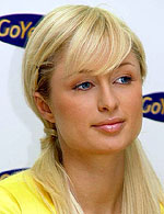 Hot pink Paris Hilton pops out of cake on beau’s b’day