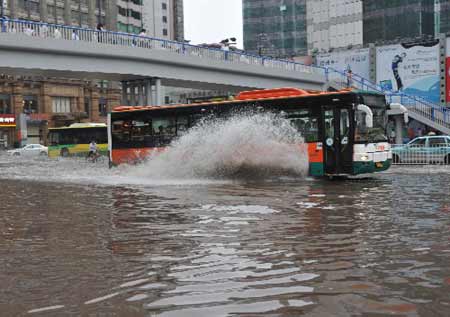 Heavy rain and winds cause flooding in parts of Britain 