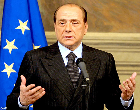 Berlusconi as Superman is his Christmas gift to grandchildren 