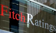 Indian Traders Ignore Fitch Ratings Downgrade for India
