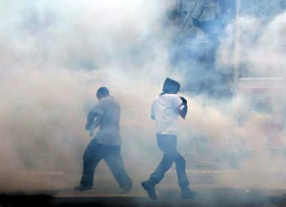 EU police in Kosovo use tear gas to prevent unrest
