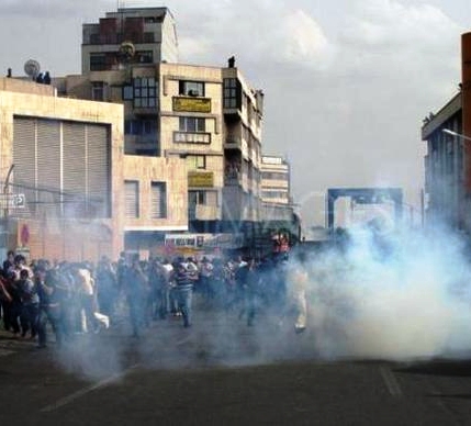 tehran-running-tear-gas