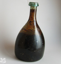 ''Witch bottle'' containing finger nails, hair and pins uncorked